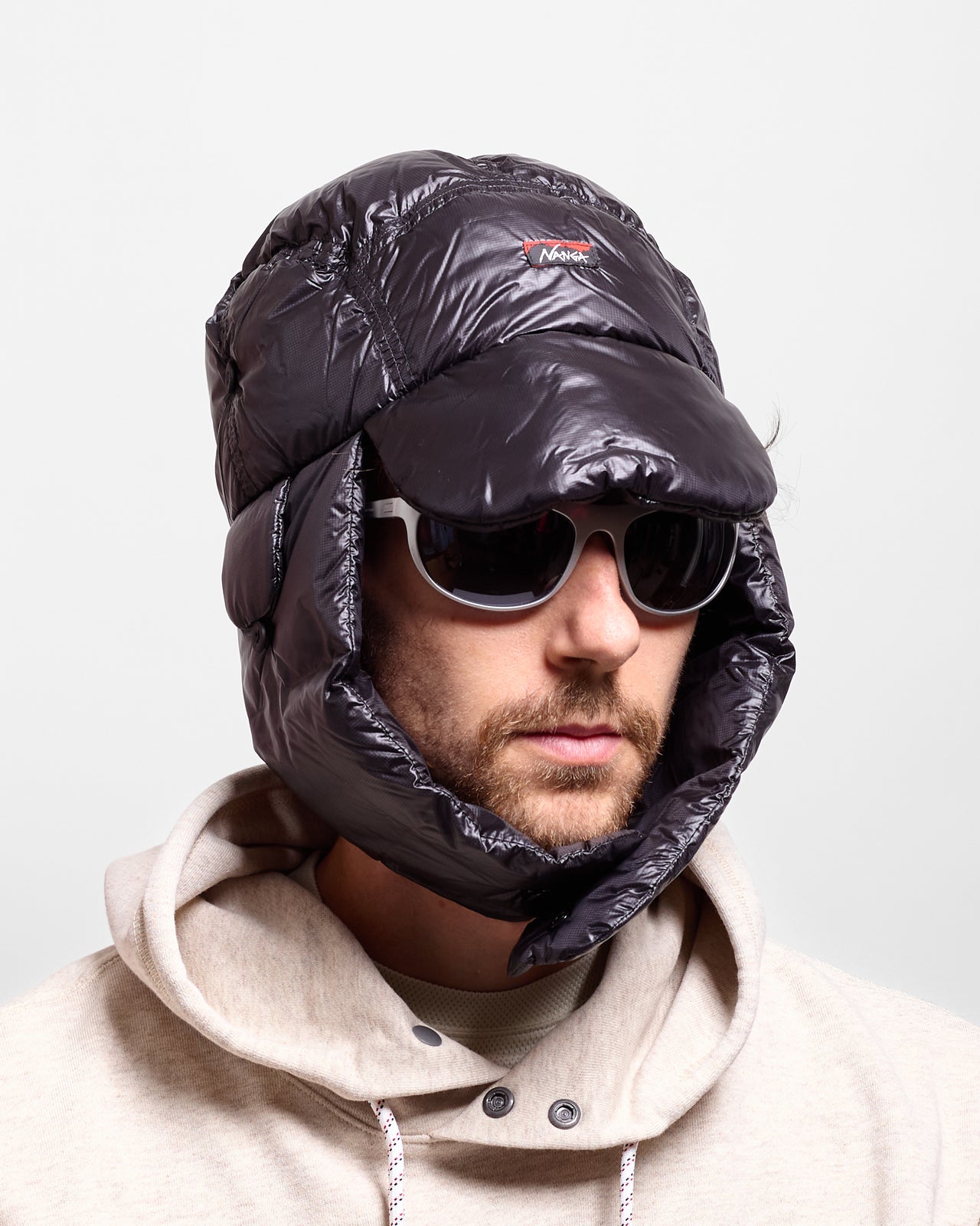 Mountain Lodge Down Ear Flap Cap in Black