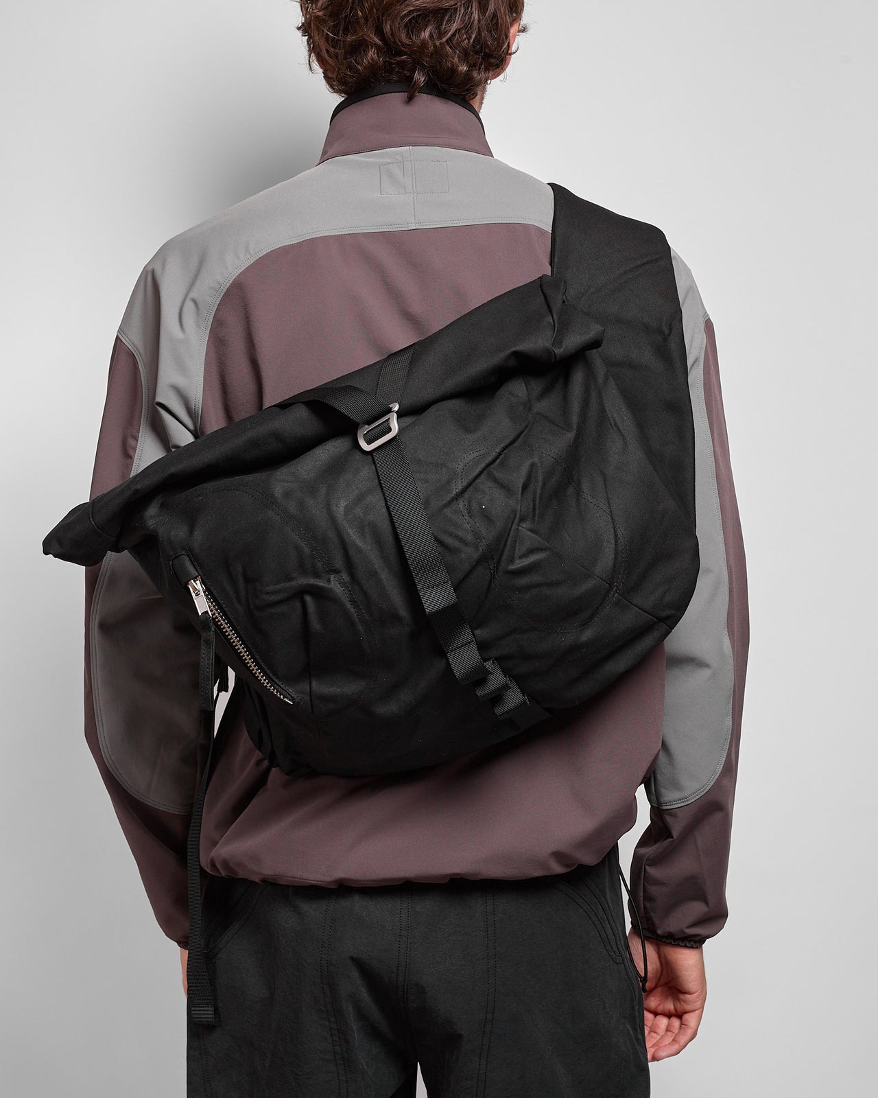 Bubble-Roll Wax Messenger Bag in Black